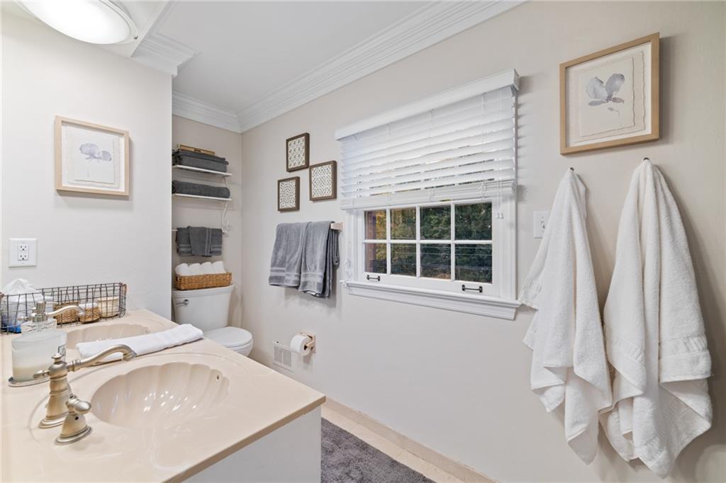 800 Hulton Road Oakmont, PA 15139 - Photo 15 of 25 a bathroom with a sink and a window