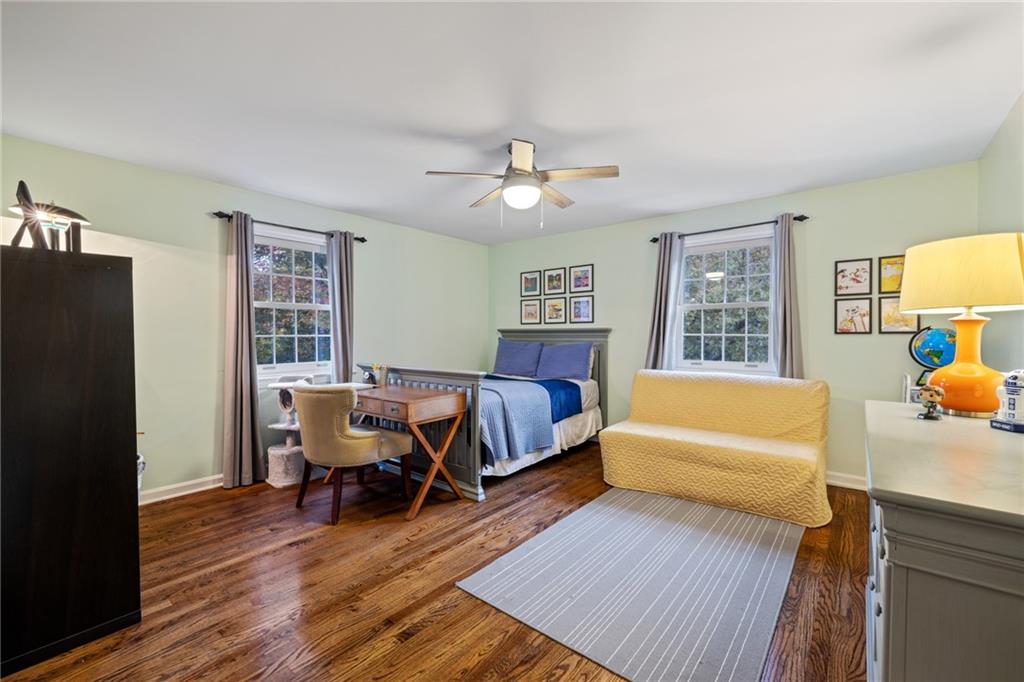 800 Hulton Road Oakmont, PA 15139 - Photo 16 of 25 a bedroom with a bed and wooden floor