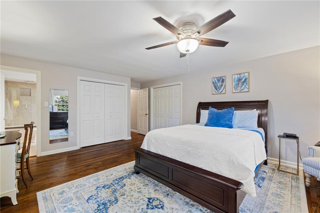 800 Hulton Road Oakmont, PA 15139 - Photo 18 of 25 a spacious bedroom with a bed and wooden floor