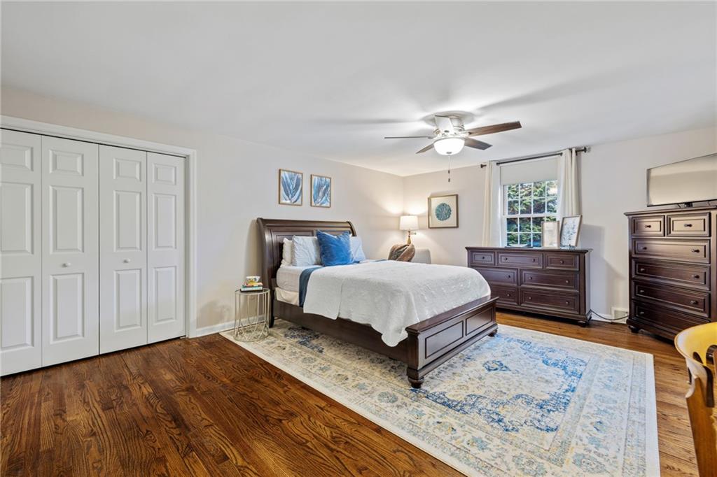 800 Hulton Road Oakmont, PA 15139 - Photo 19 of 25 a bedroom with a bed dresser and a window
