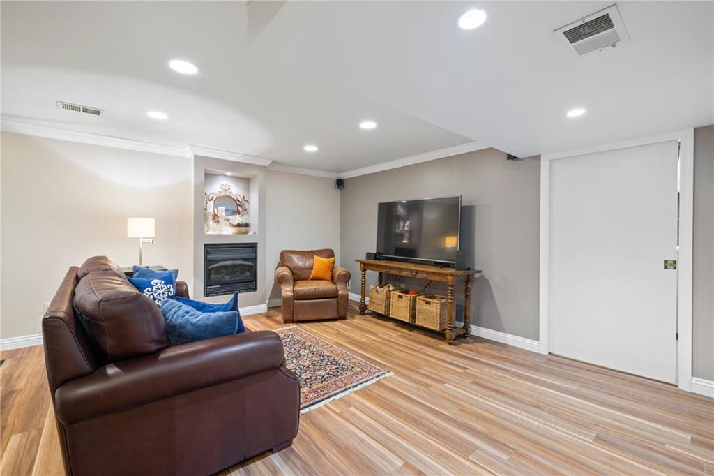 800 Hulton Road Oakmont, PA 15139 - Photo 20 of 25 a living room with furniture and a flat screen tv