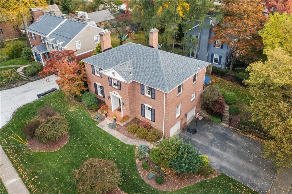 800 Hulton Road Oakmont, PA 15139 - Photo 2 of 25 an aerial view of a house with a yard table and chairs