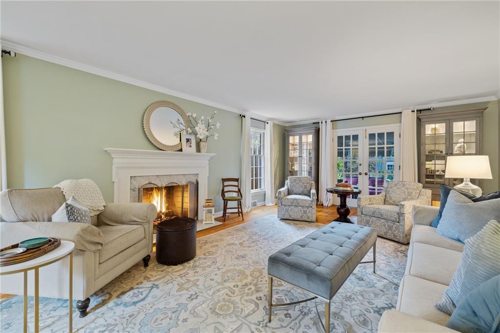 800 Hulton Road Oakmont, PA 15139 - Photo 5 of 25 a living room with furniture and a fireplace