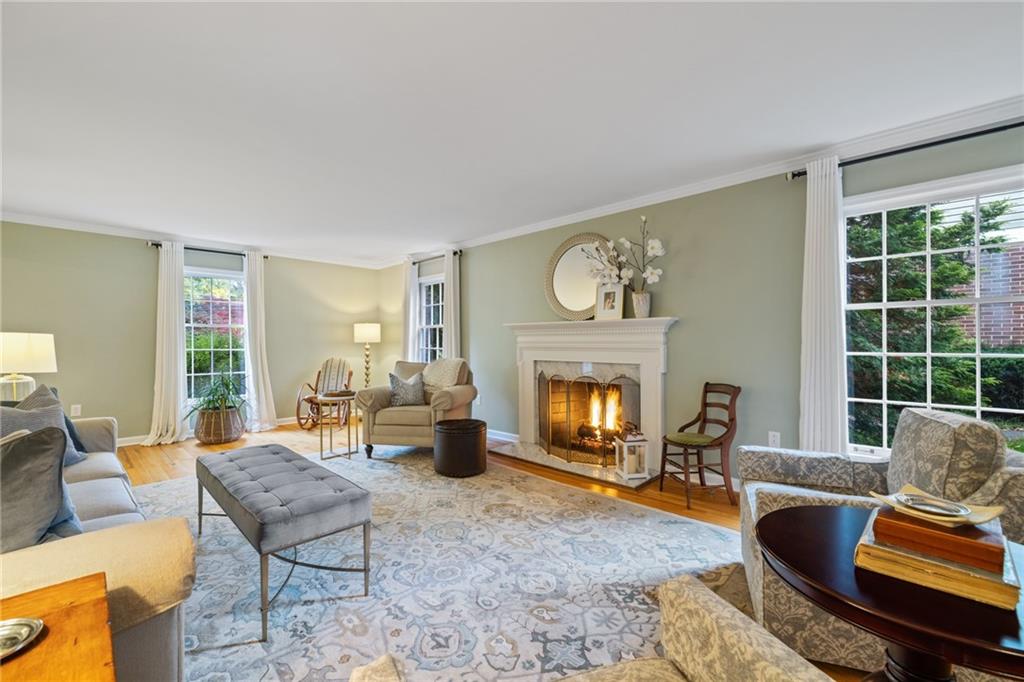 800 Hulton Road Oakmont, PA 15139 - Photo 6 of 25 a living room with furniture and a fireplace