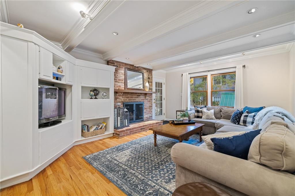 800 Hulton Road Oakmont, PA 15139 - Photo 10 of 25 a living room with furniture rug and a fireplace