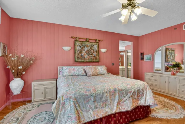 a lobby with furniture and floor to ceiling window