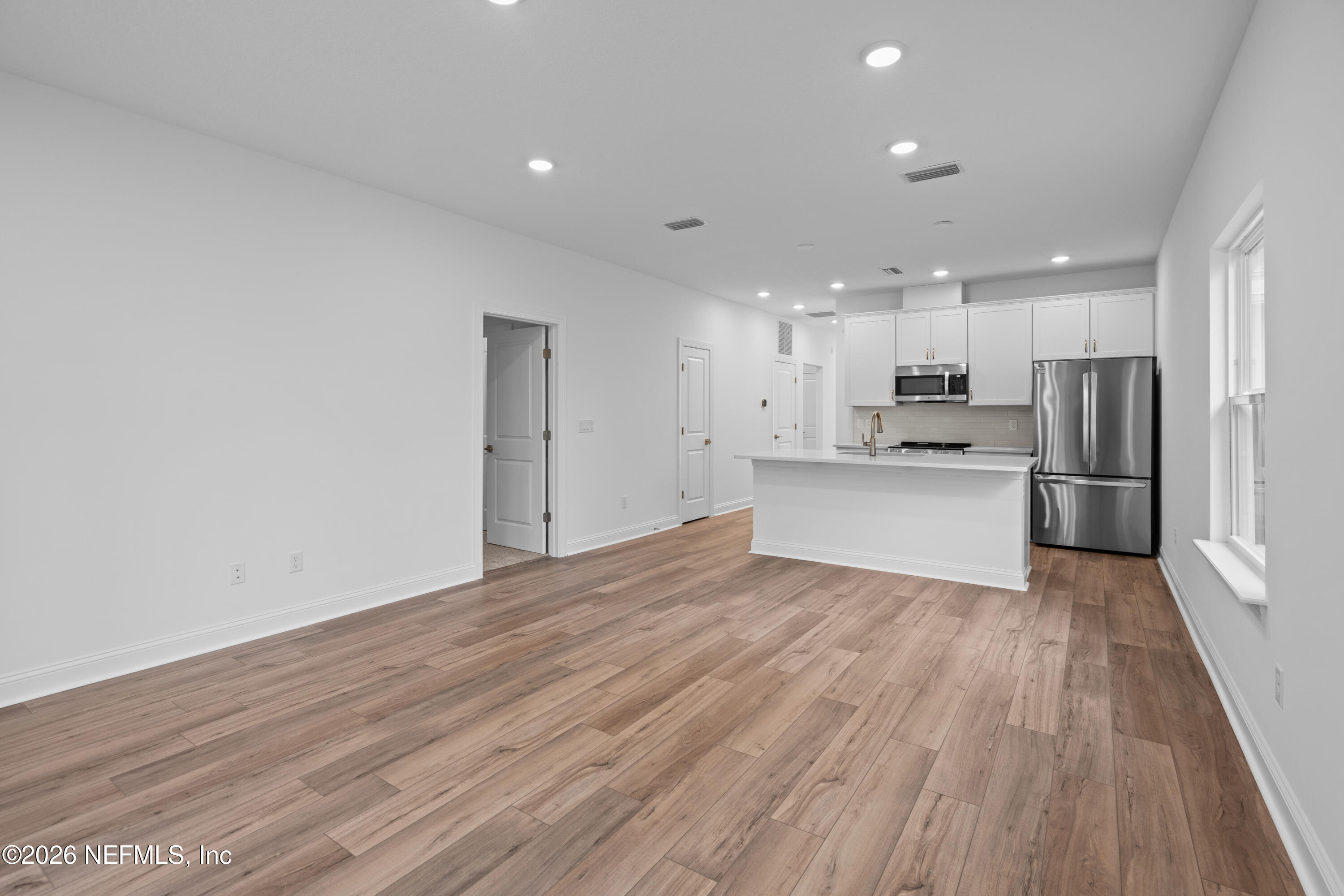 221 Dartmouth Road St. Augustine, FL 32086 - Photo 18 of 24 a view of kitchen with wooden floor
