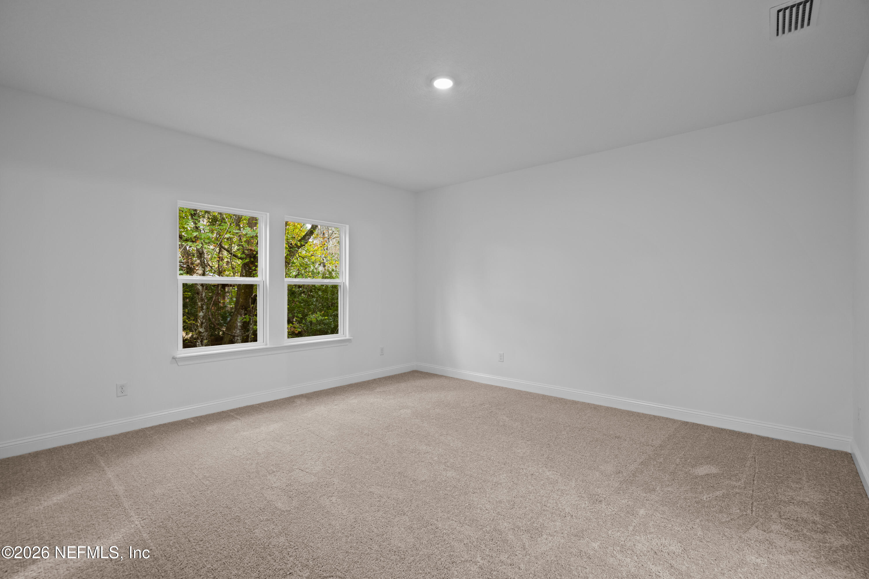 221 Dartmouth Road St. Augustine, FL 32086 - Photo 19 of 24 an empty room with a window