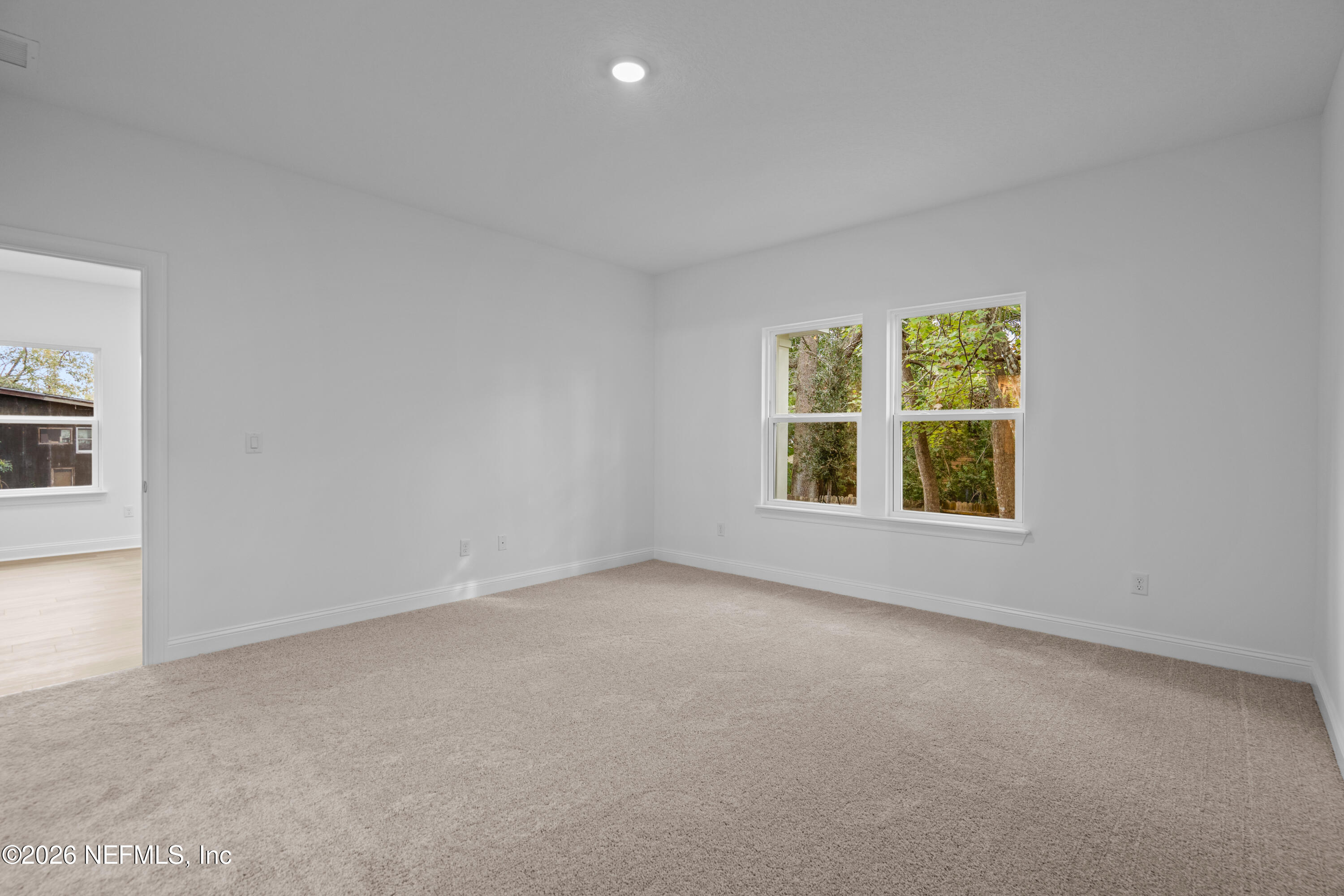 221 Dartmouth Road St. Augustine, FL 32086 - Photo 20 of 24 an empty room with a window