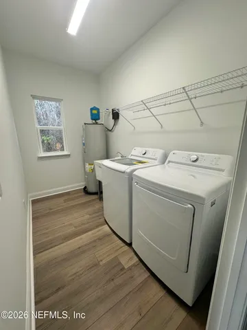 a utility room with dryer and washer