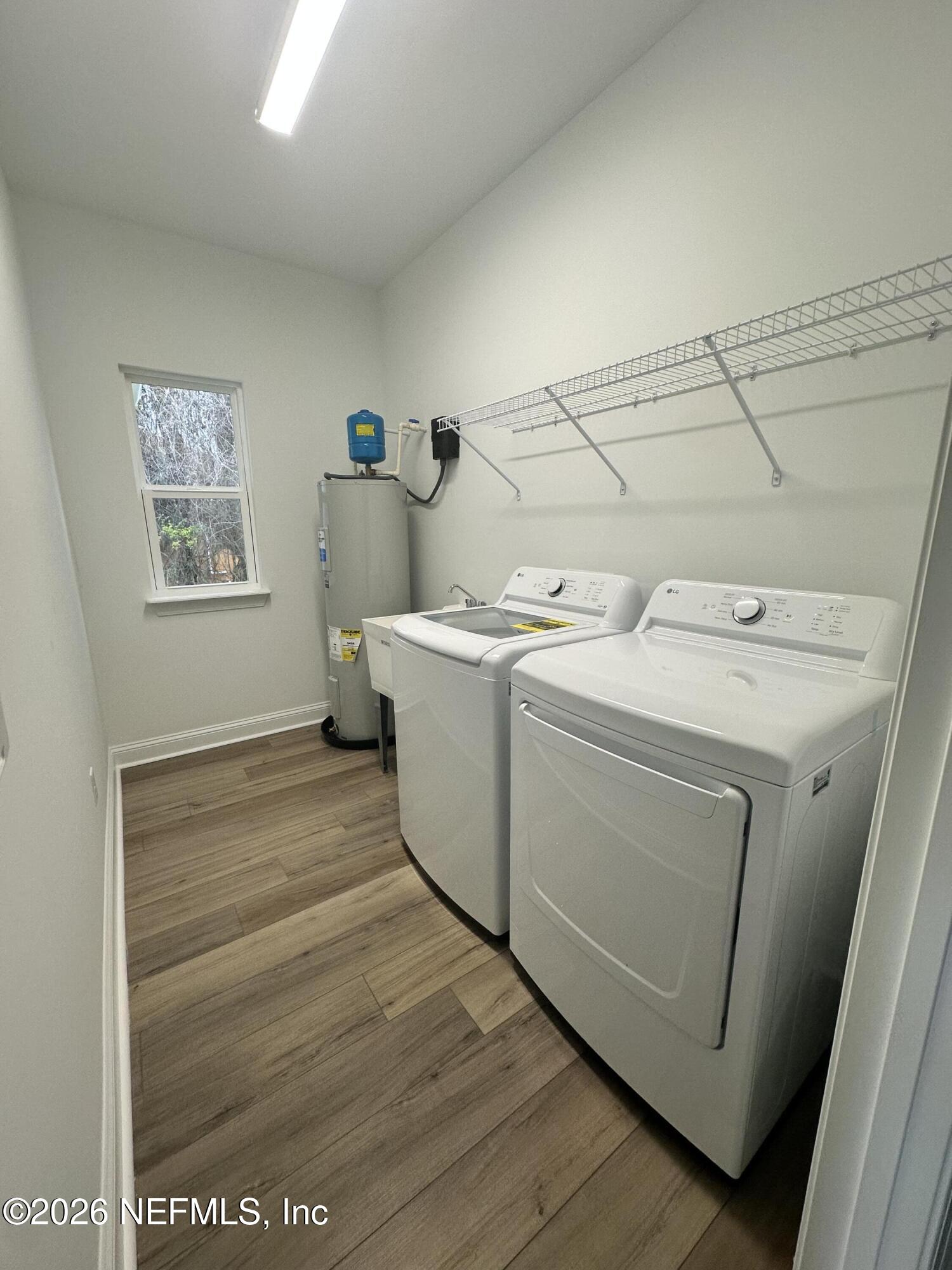 221 Dartmouth Road St. Augustine, FL 32086 - Photo 24 of 24 a utility room with dryer and washer