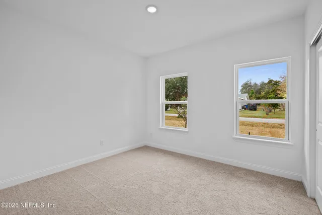 an empty room with windows