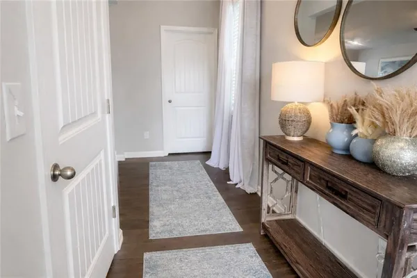 a bathroom with a mirror and a sink