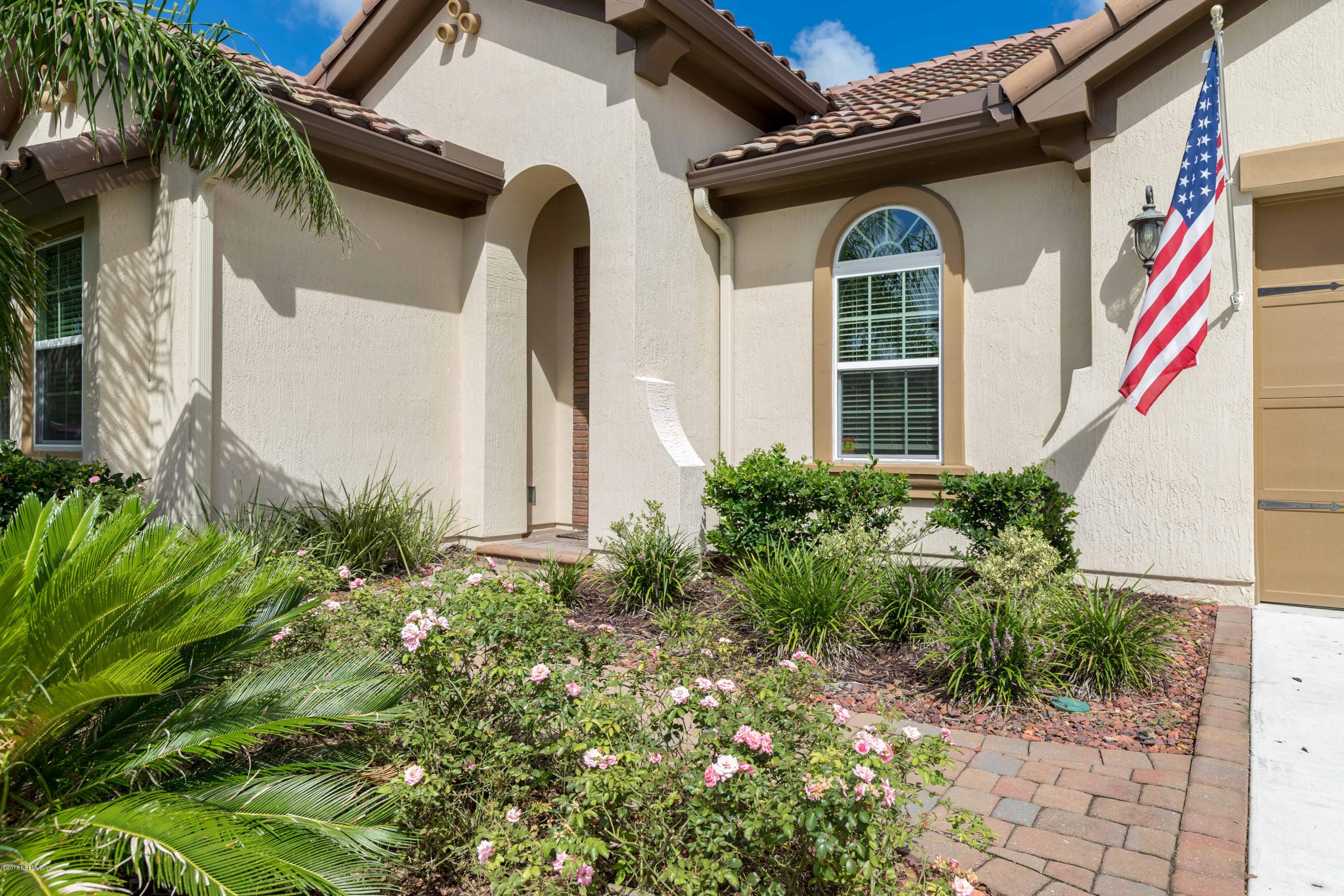 3811 Valverde Circle Jacksonville, FL 32224 - Photo 2 of 42 a front view of a house with garden