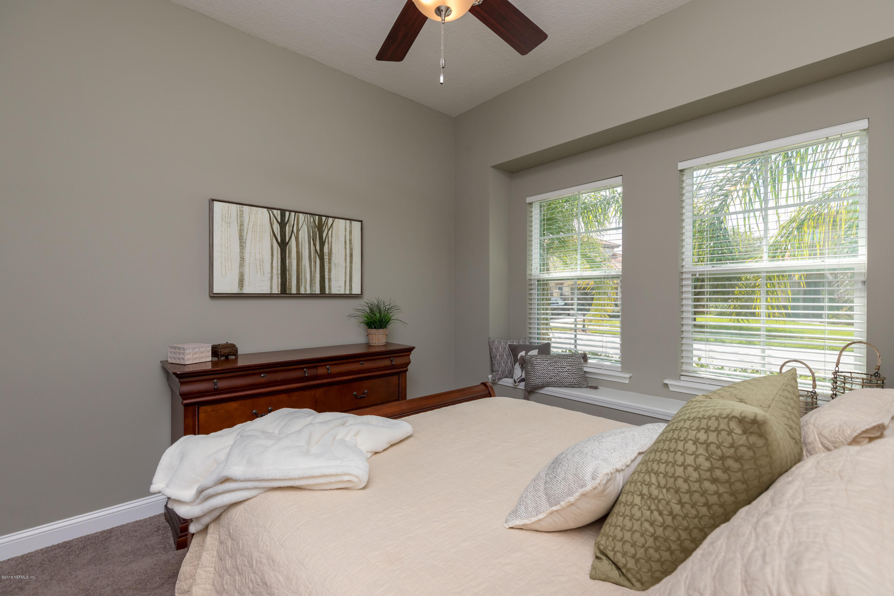 3811 Valverde Circle Jacksonville, FL 32224 - Photo 25 of 42 a bedroom with a bed and window