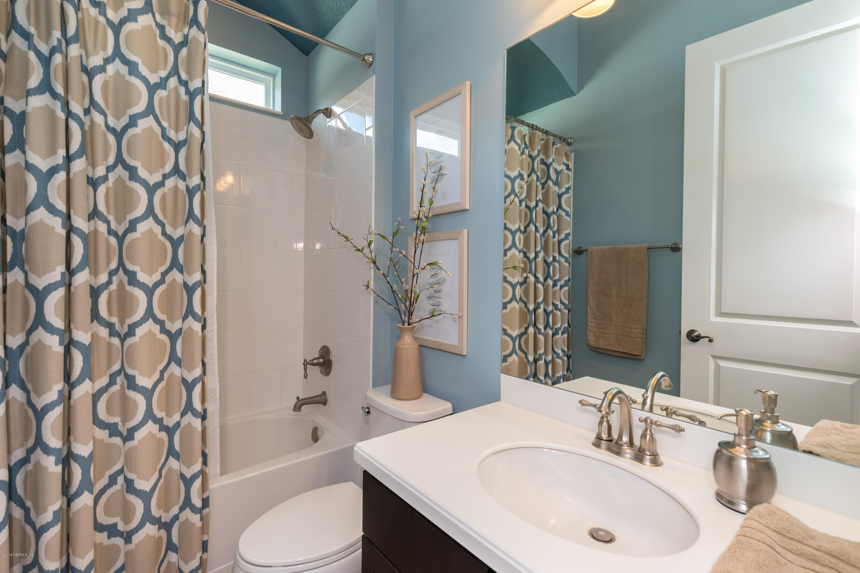 3811 Valverde Circle Jacksonville, FL 32224 - Photo 26 of 42 a bathroom with a sink toilet and shower