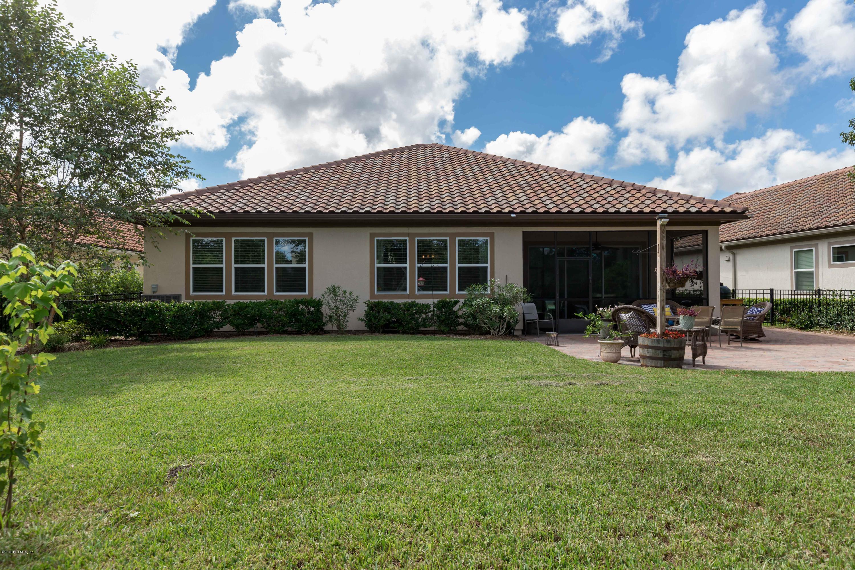 3811 Valverde Circle Jacksonville, FL 32224 - Photo 35 of 42 a view of a house with backyard sitting area and garden