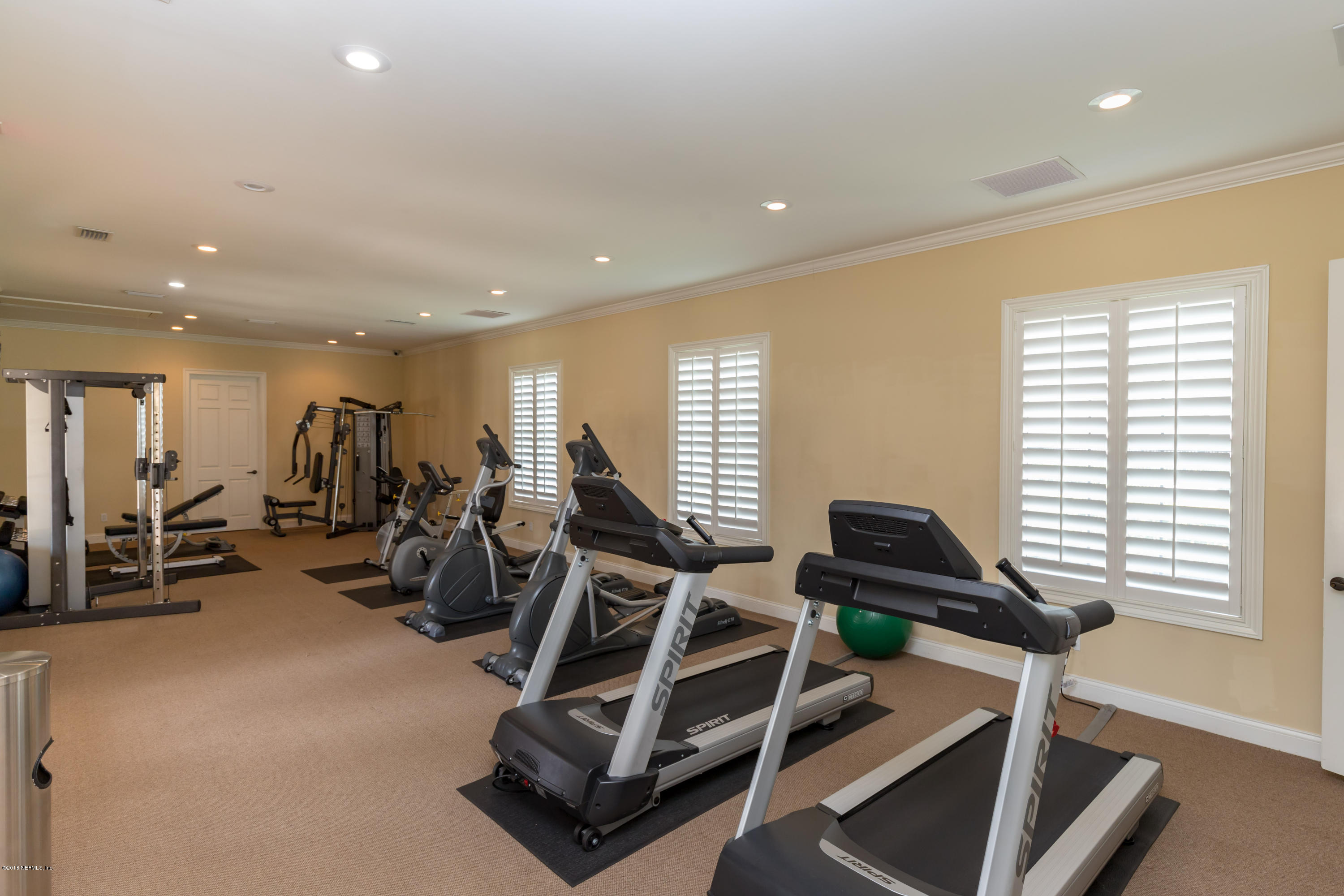 3811 Valverde Circle Jacksonville, FL 32224 - Photo 40 of 42 a view of a room with gym equipment