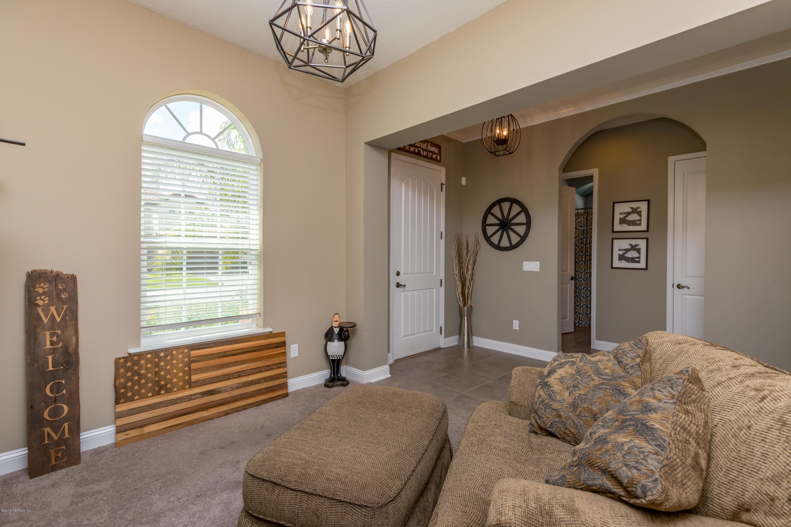 3811 Valverde Circle Jacksonville, FL 32224 - Photo 4 of 42 a bedroom with a bed and a window