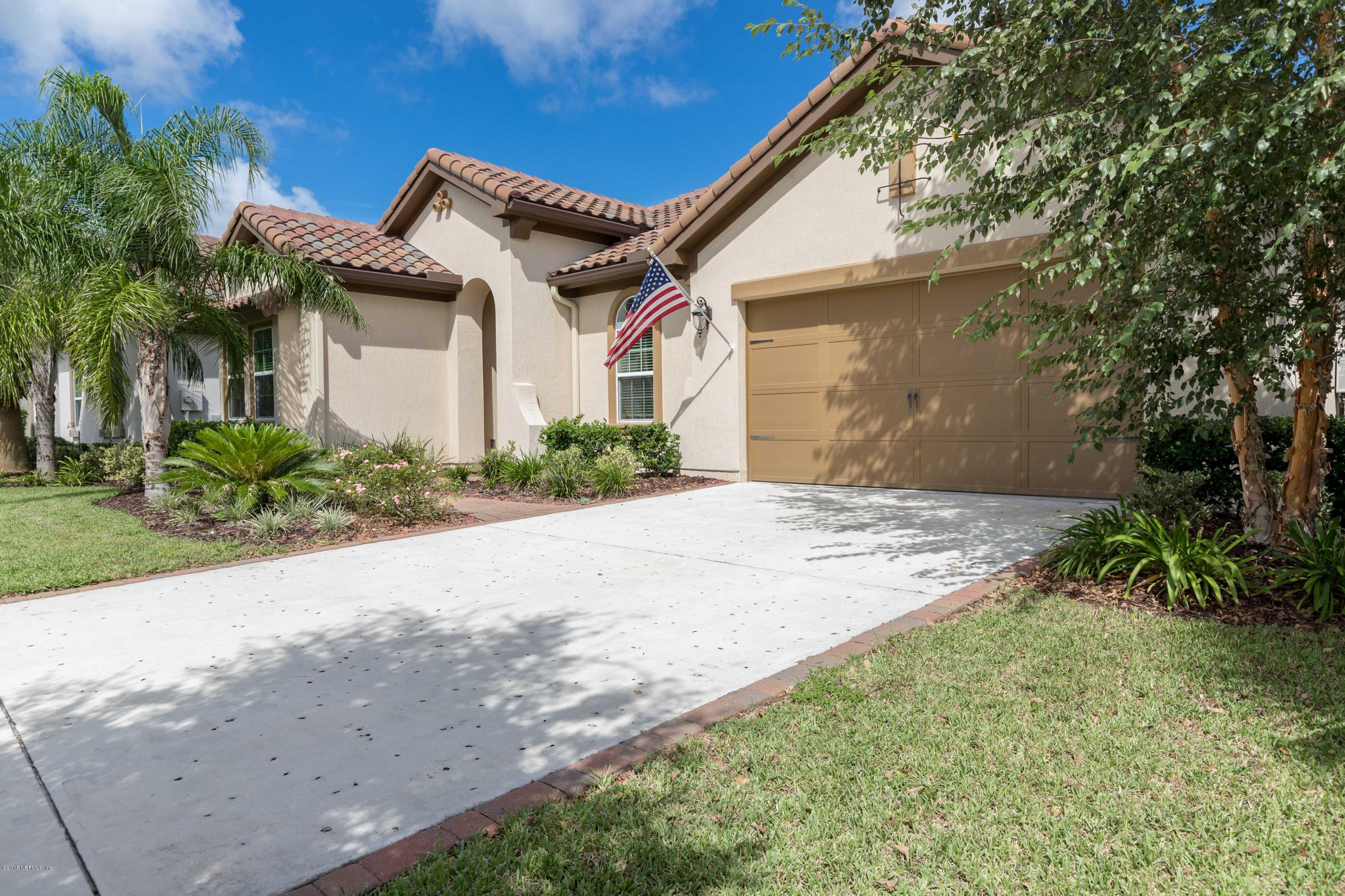 3811 Valverde Circle Jacksonville, FL 32224 - Photo 41 of 42 a front view of a house with a garden
