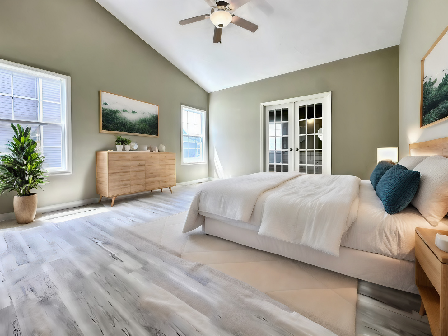 3904 Boulder Ridge Drive Champaign, IL 61822 - Photo 52 of 110 a bedroom with a large bed and a chandelier