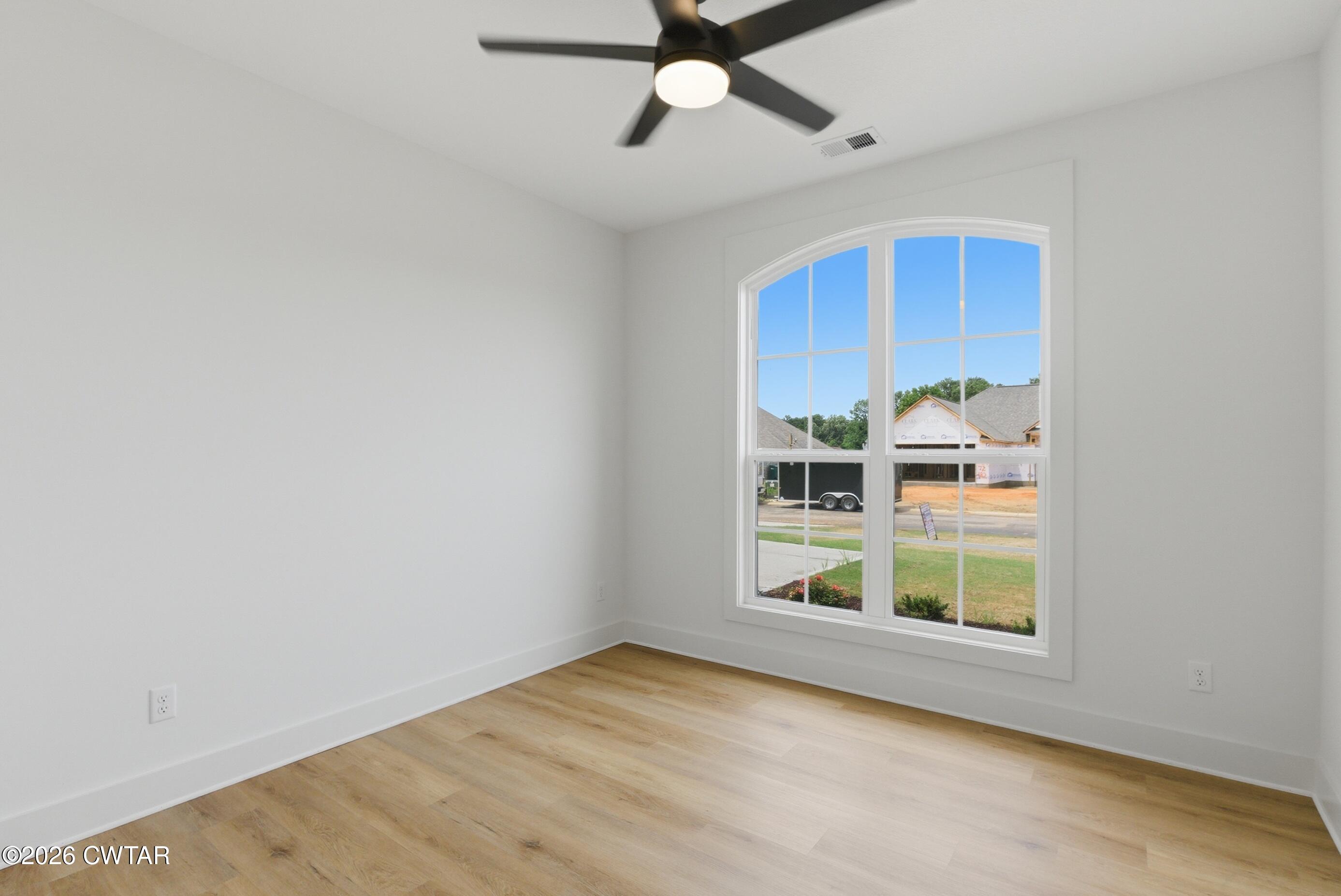 179 Daybreak Loop Medina, TN 38355 - Photo 23 of 32 a view of an empty room with a window