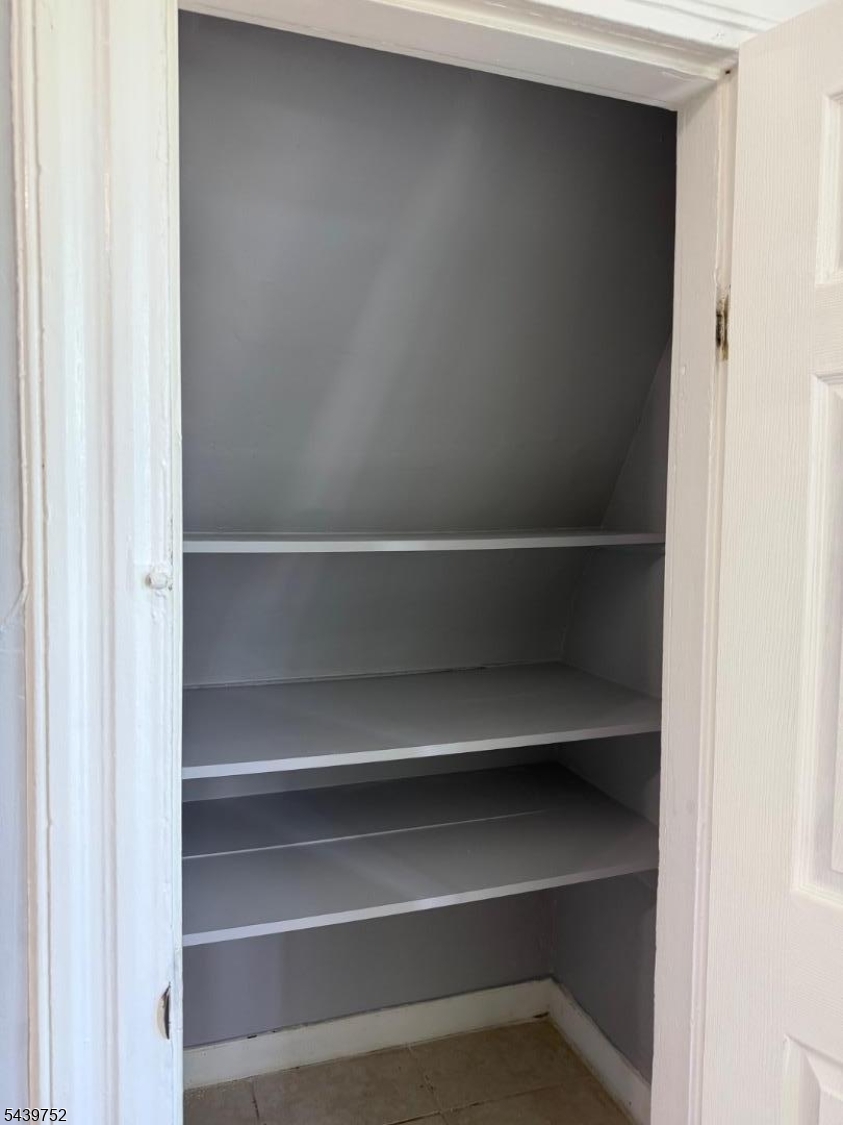 58 North 5th Street, Unit 3 Newark, NJ 07107 - Photo 5 of 11 a view of walk in closet with empty racks