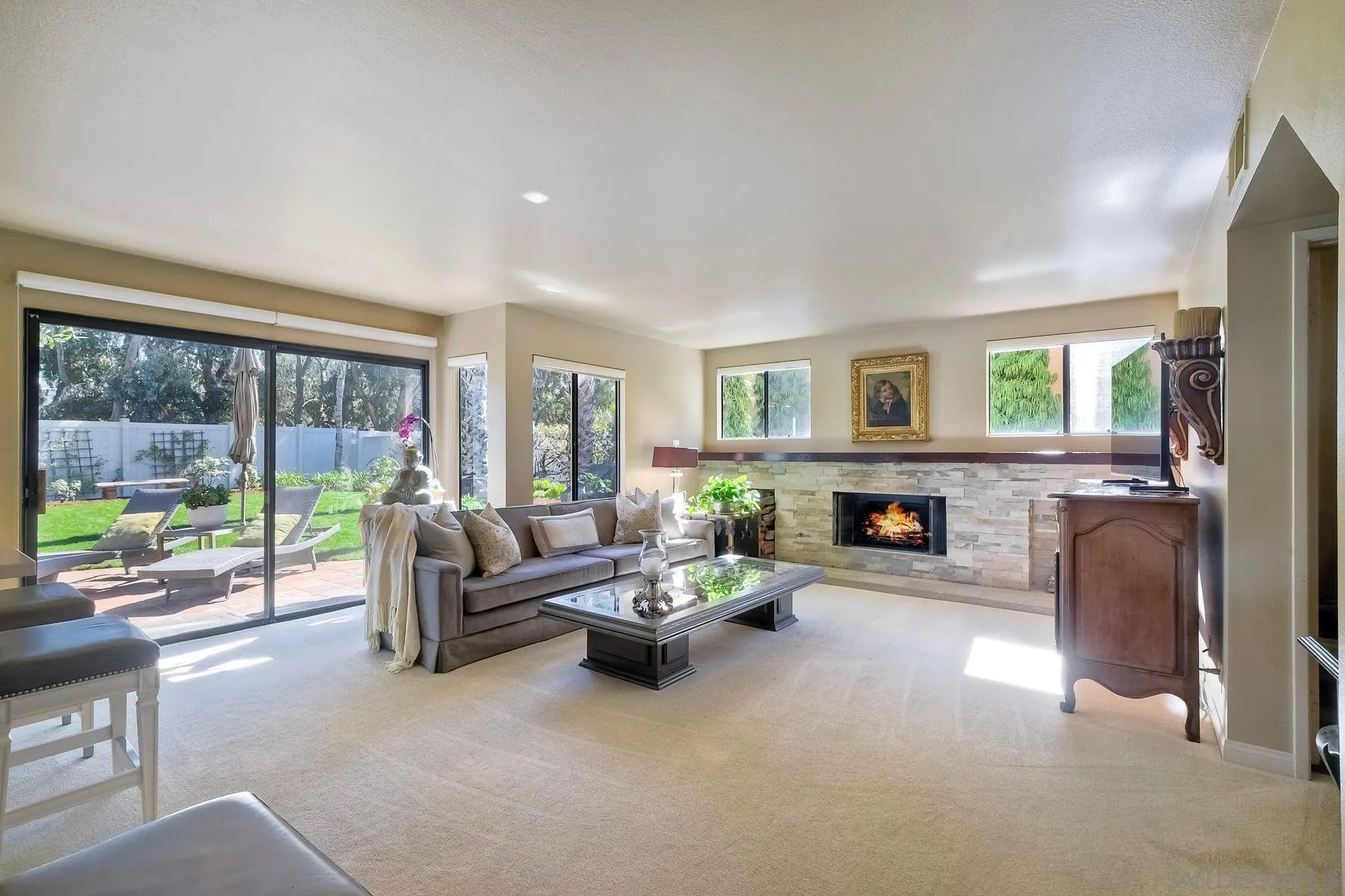 11467 Box Elder Place San Diego, CA 92127 - Photo 13 of 31 a living room with furniture and a fireplace