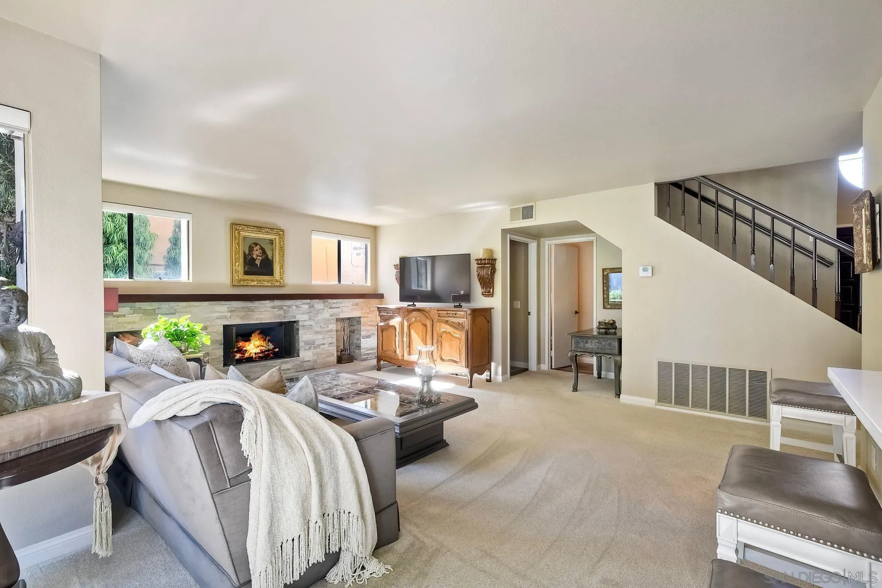 11467 Box Elder Place San Diego, CA 92127 - Photo 14 of 31 a living room with fireplace furniture and a wooden floor
