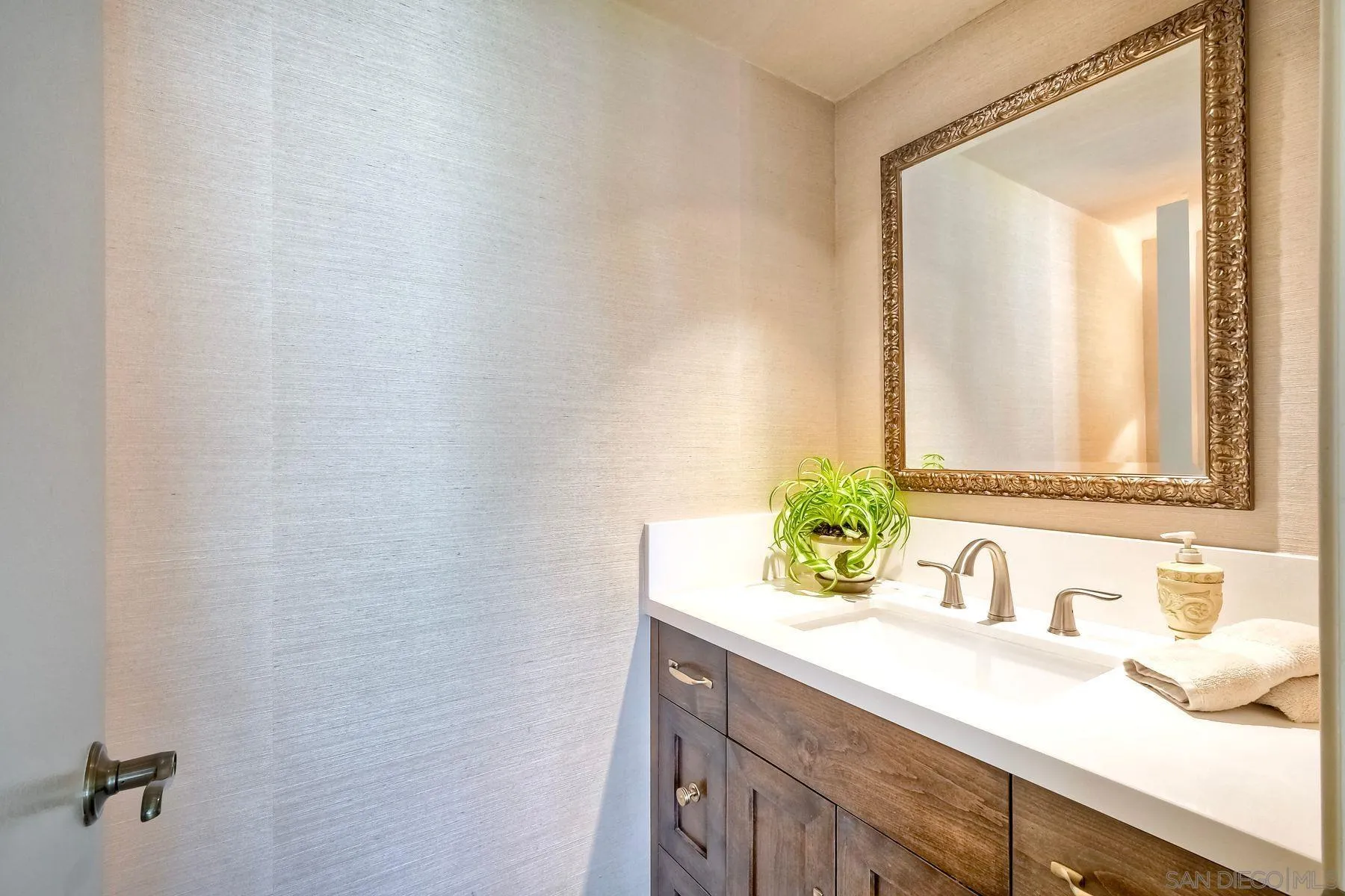 11467 Box Elder Place San Diego, CA 92127 - Photo 15 of 31 a bathroom with a granite countertop sink and a mirror