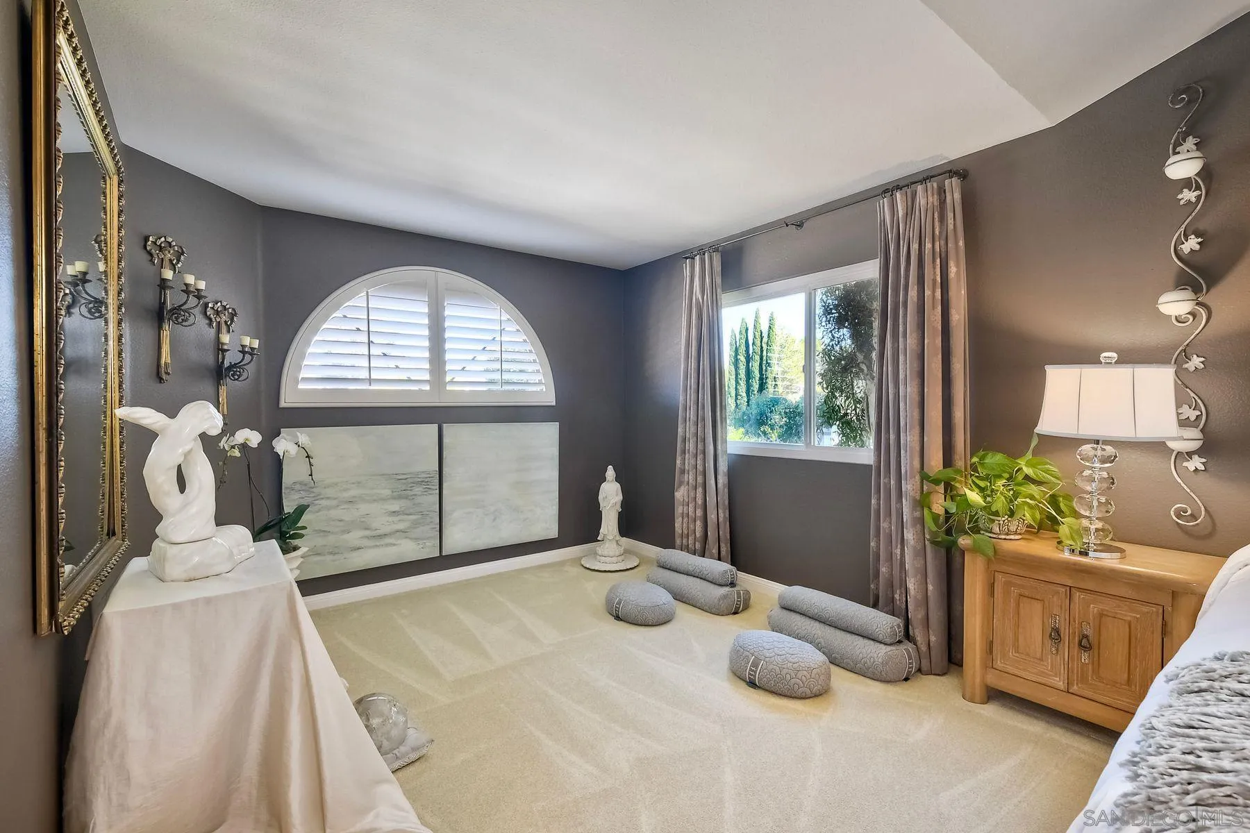 11467 Box Elder Place San Diego, CA 92127 - Photo 19 of 31 a bedroom with a bed and large windows