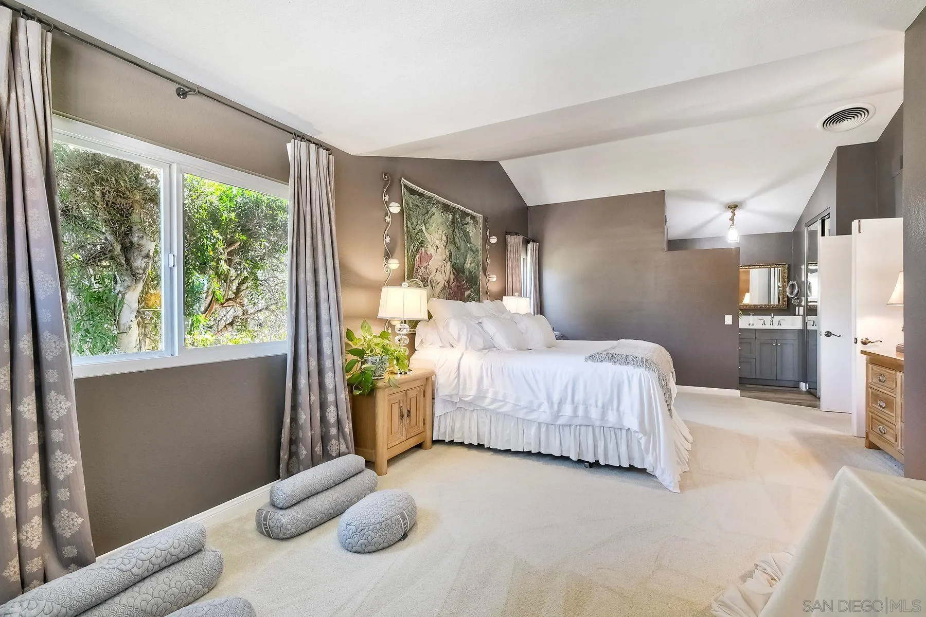 11467 Box Elder Place San Diego, CA 92127 - Photo 20 of 31 a bedroom with furniture and a large window