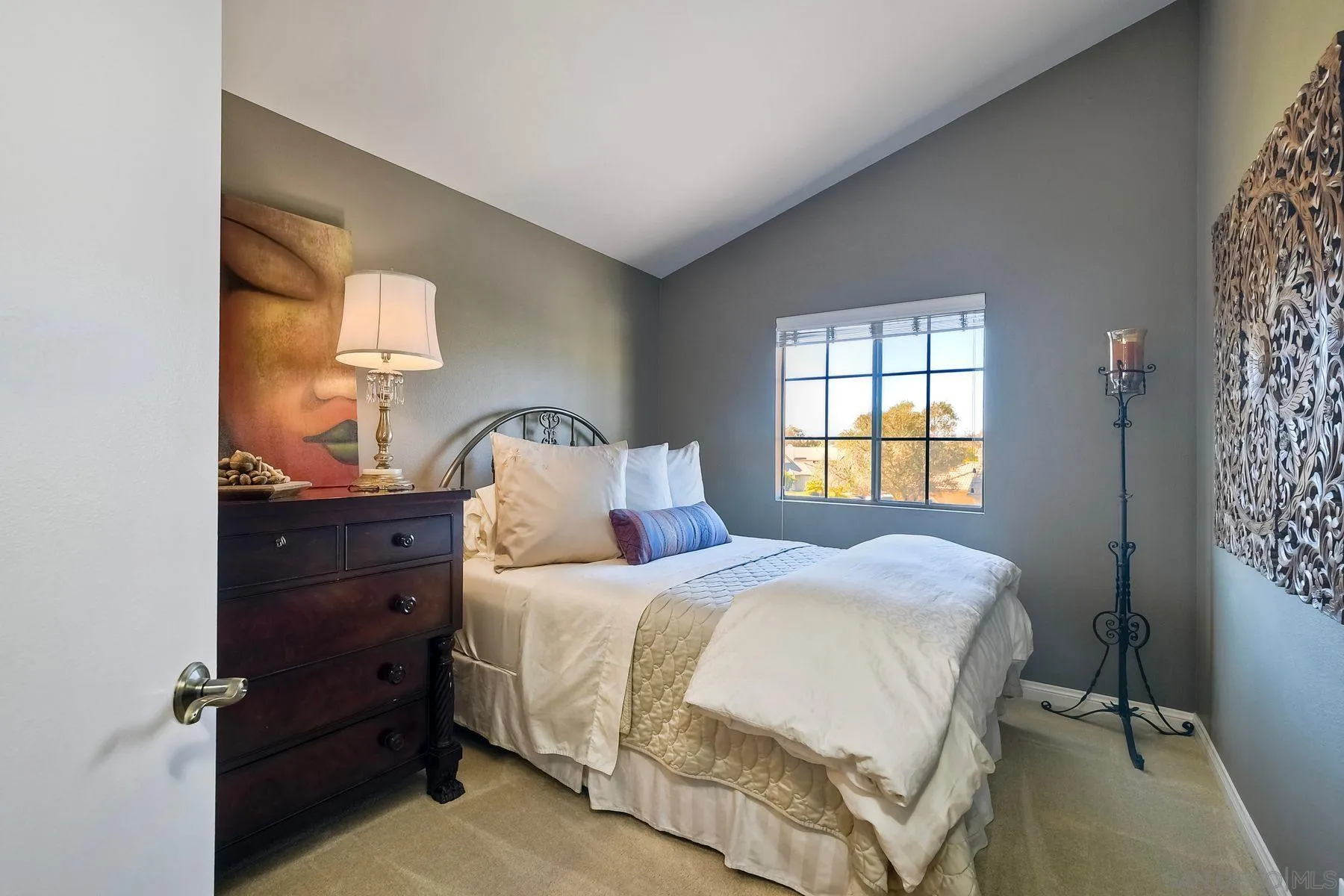 11467 Box Elder Place San Diego, CA 92127 - Photo 24 of 31 a bedroom with a bed and a window