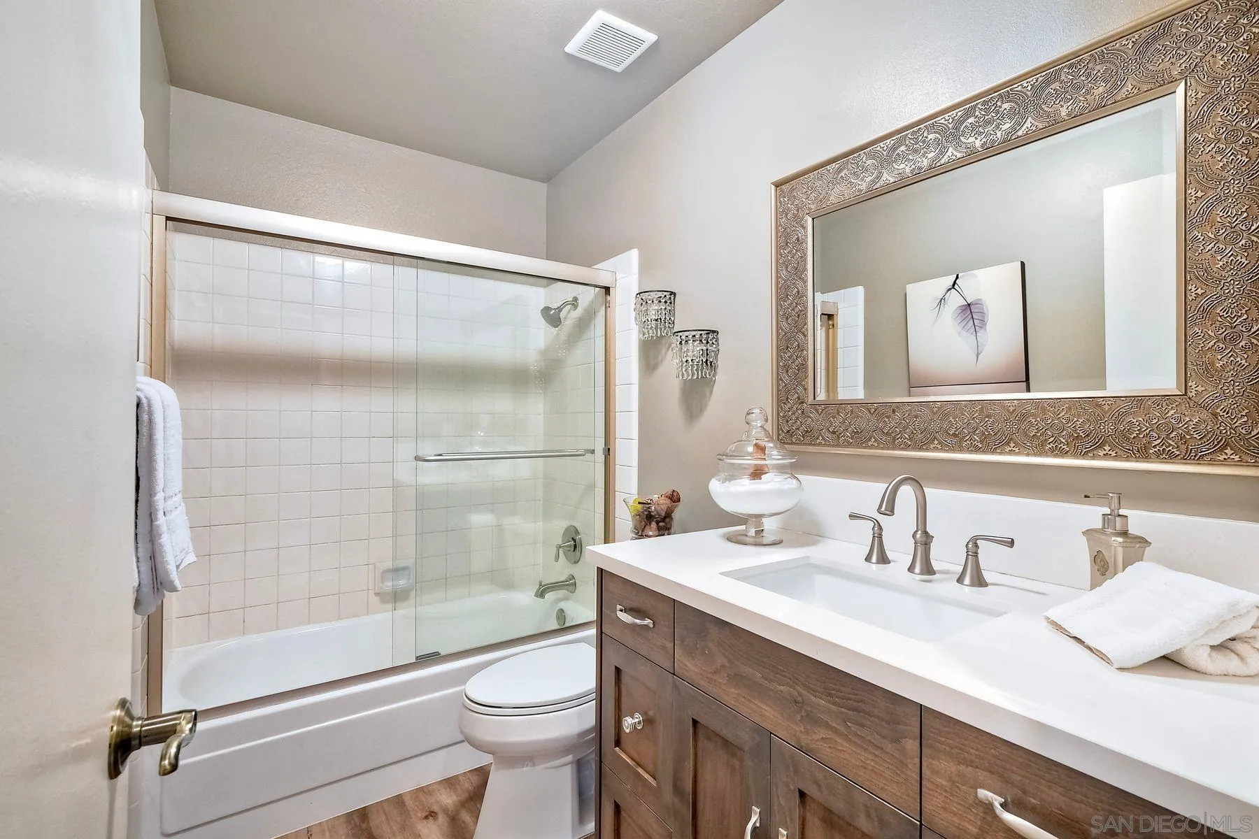 11467 Box Elder Place San Diego, CA 92127 - Photo 25 of 31 a bathroom with a granite countertop sink toilet and shower