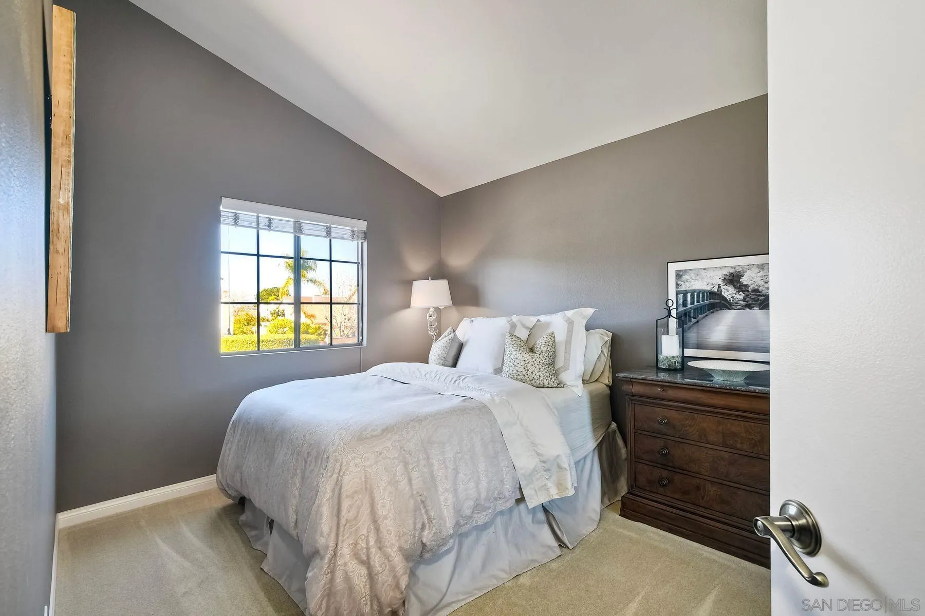 11467 Box Elder Place San Diego, CA 92127 - Photo 26 of 31 a bedroom with a bed and a window