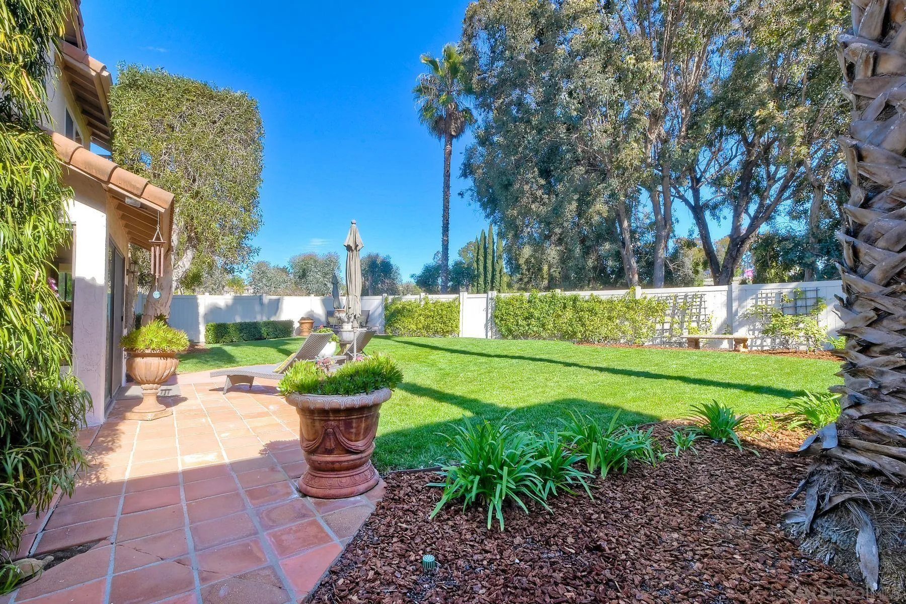 11467 Box Elder Place San Diego, CA 92127 - Photo 28 of 31 a view of a garden with a fountain
