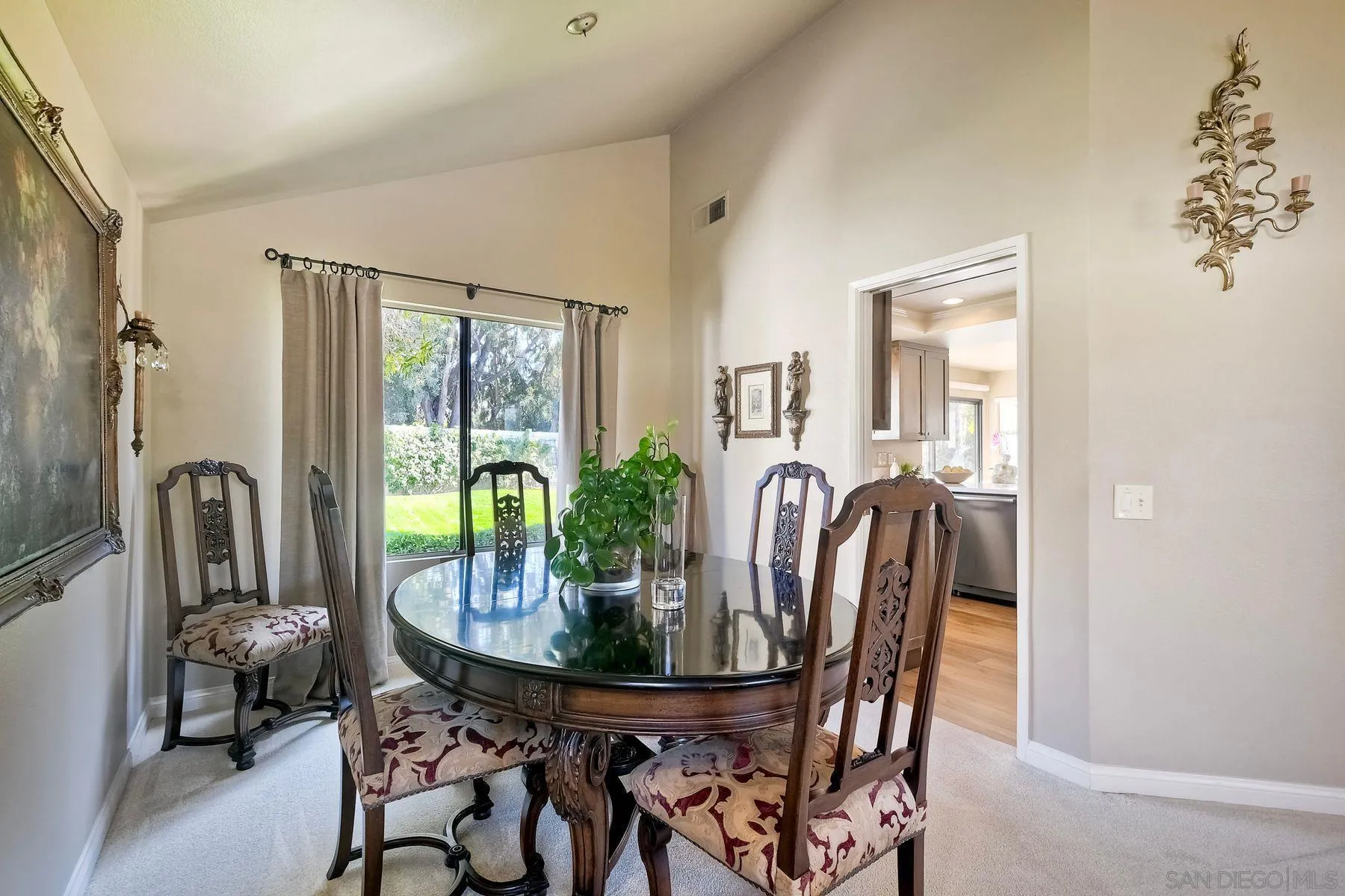 11467 Box Elder Place San Diego, CA 92127 - Photo 7 of 31 a view of a dining room with furniture and window