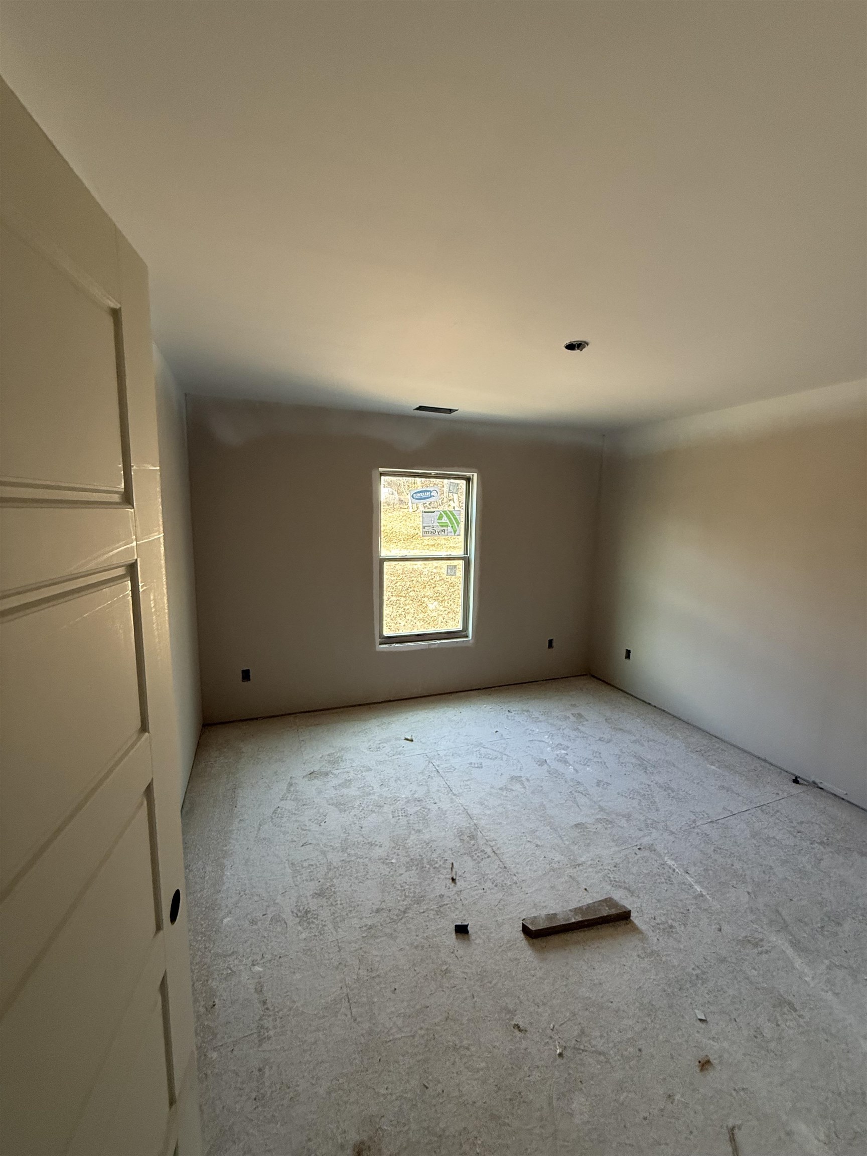 104 Stonebrook Ripley, TN 38063 - Photo 6 of 6 a view of an empty room with a window