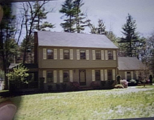 1079 Boston Post Road Sudbury, MA 01776 - Photo 1 of 1 a view of a house with a yard and sitting area