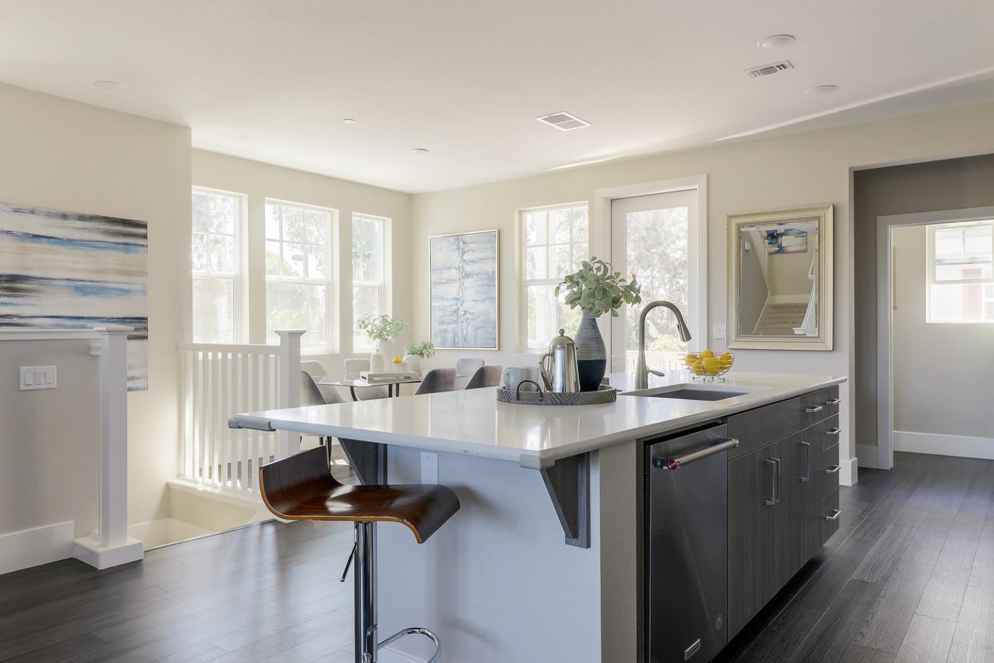 388 Circuit Way Mountain View, CA 94043 - Photo 12 of 26 a view of a kitchen with dining table chairs and wooden floor