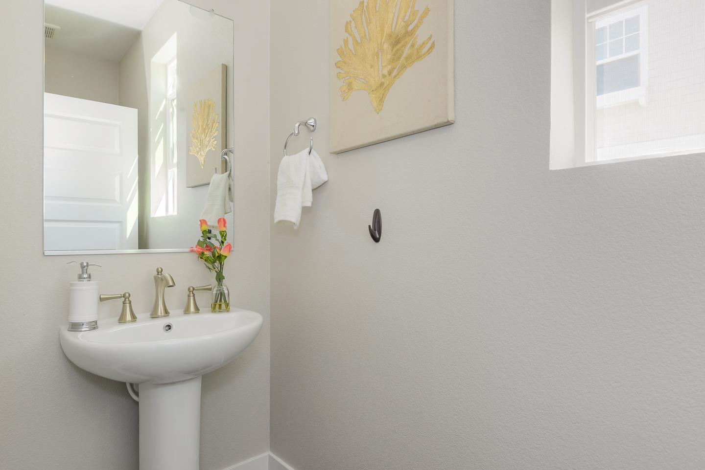 388 Circuit Way Mountain View, CA 94043 - Photo 16 of 26 a bathroom with a sink and a mirror