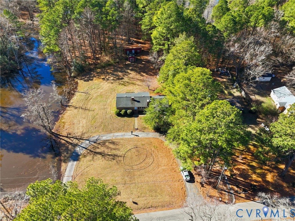 6106 Lewis Road Petersburg, VA 23803 - Photo 23 of 29 a view of a yard with wooden fence