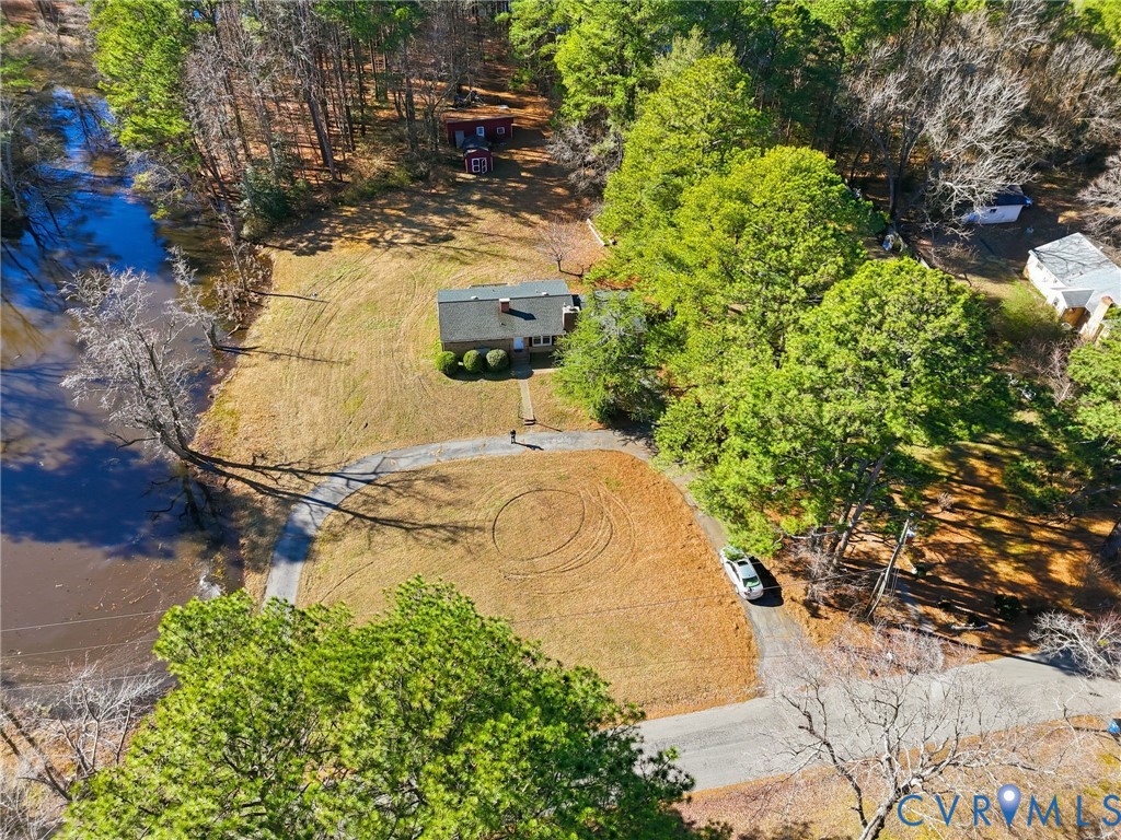 6106 Lewis Road Petersburg, VA 23803 - Photo 25 of 29 a view of a swimming pool with a yard