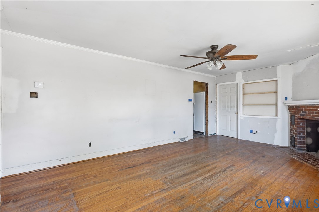 6106 Lewis Road Petersburg, VA 23803 - Photo 4 of 29 wooden floor in an empty room
