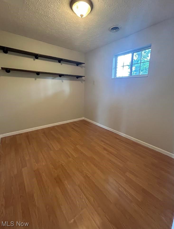 35 Chainey Run Road Marietta, OH 45750 - Photo 14 of 28 Bedroom 3 with a textured ceiling and shelving