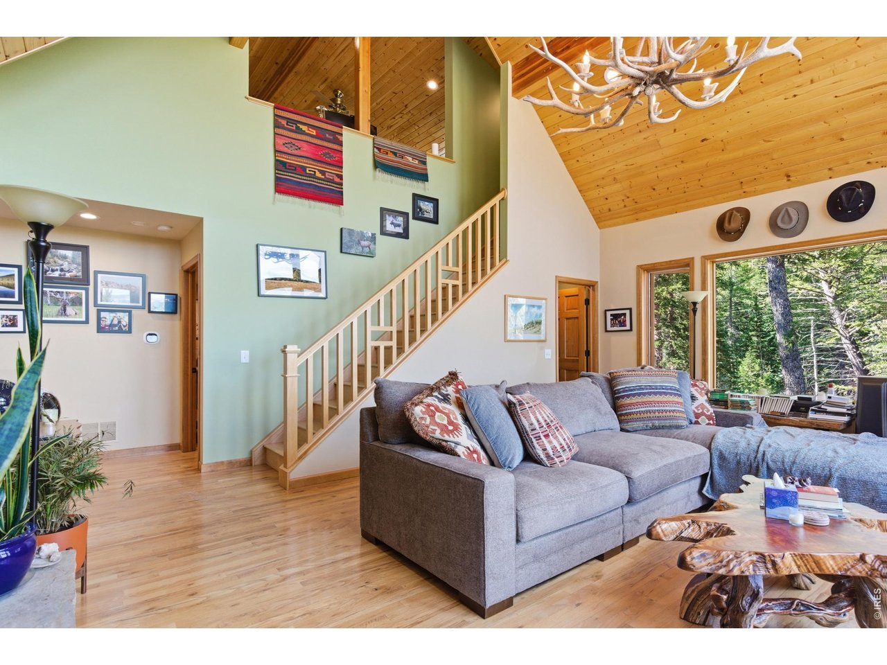 4079 Little Valley Road Estes Park, CO 80517 - Photo 13 of 39 a living room with furniture and wooden floor