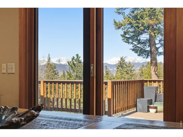 a living room with fireplace furniture and a flat screen tv