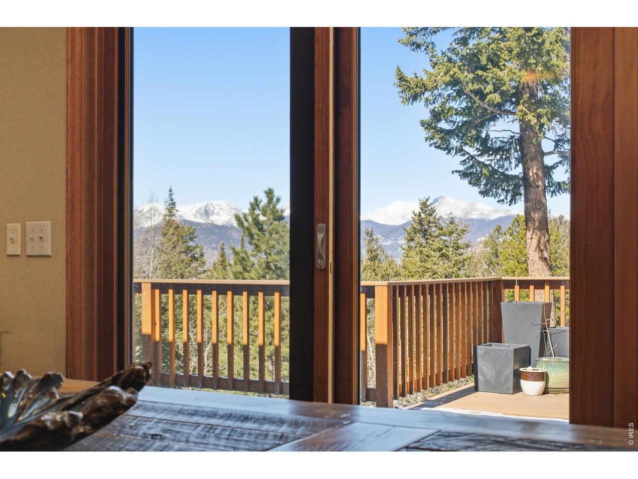 4079 Little Valley Road Estes Park, CO 80517 - Photo 18 of 39 a view of a balcony with a yard