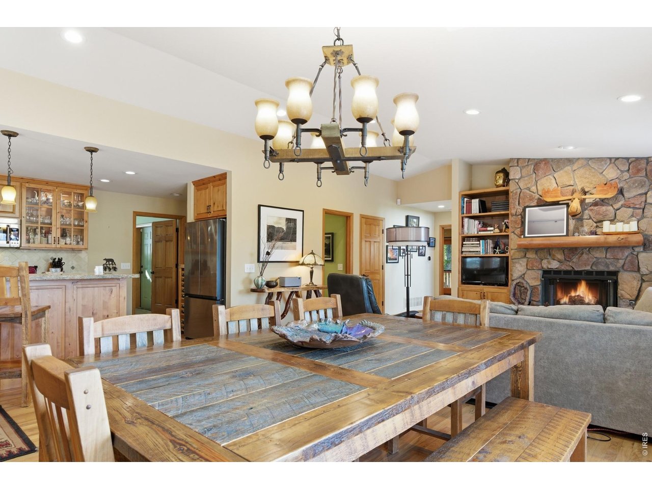 4079 Little Valley Road Estes Park, CO 80517 - Photo 19 of 39 a living room with fireplace furniture and a flat screen tv