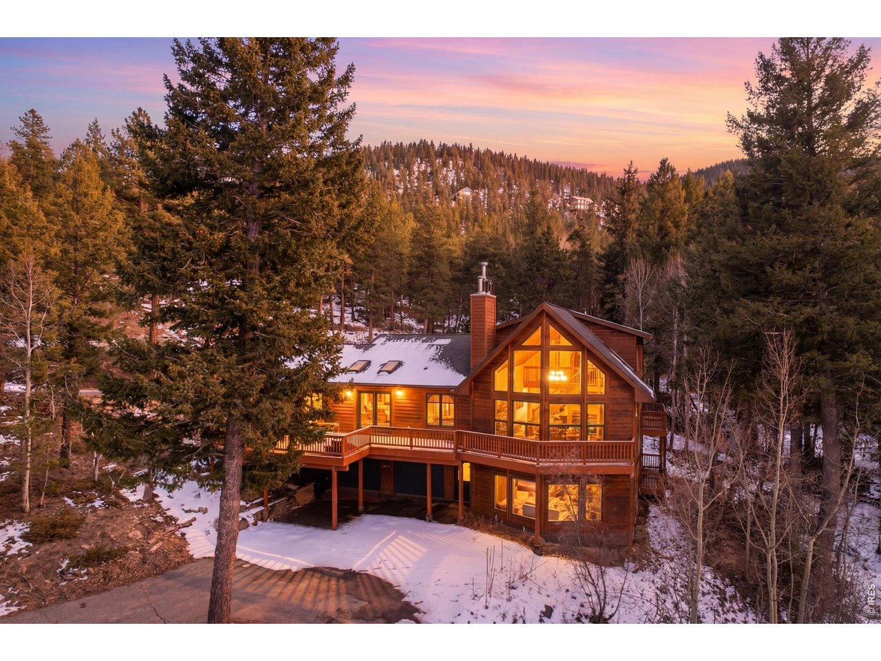 4079 Little Valley Road Estes Park, CO 80517 - Photo 2 of 39 a view of a house with a yard from a balcony